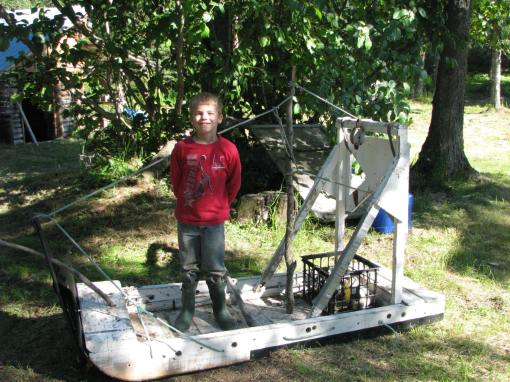The Little Pirate and his ship at Dad's Cabin.