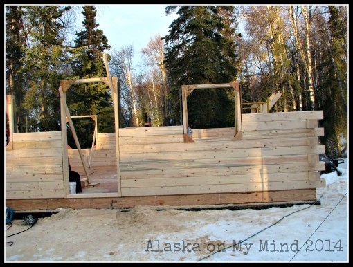 the front of the cabin, faces south.