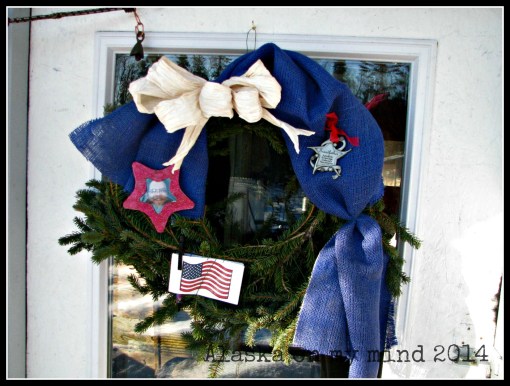 The wreath that the kids and I put together. Little Bit helped me mostly.