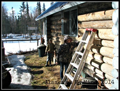 Thing 1 and Thing 2 sanding the logs.