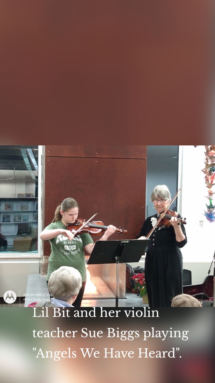 Lil Bit and her violin teacher Sue Biggs playing "Angels We Have Heard".